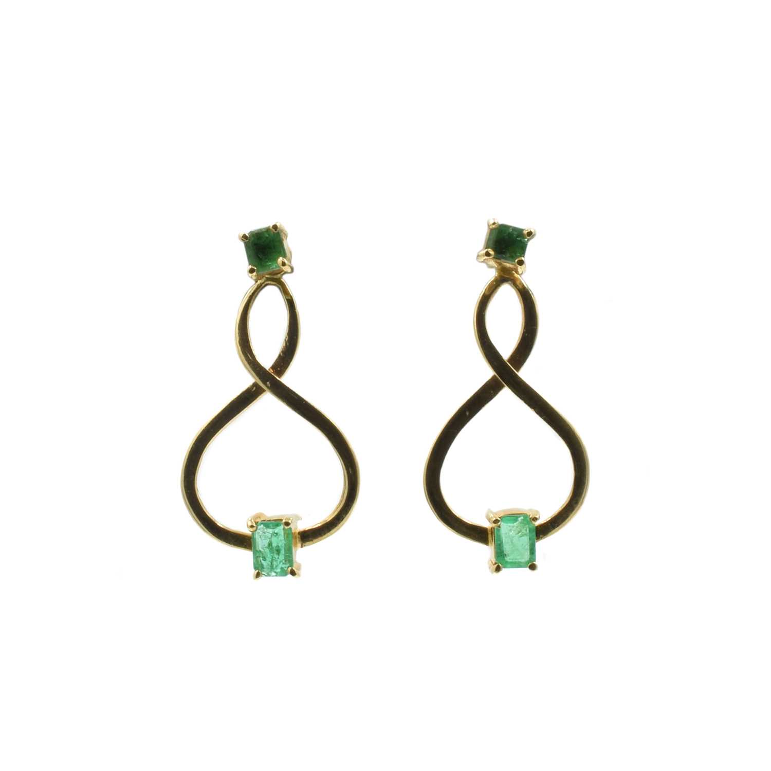 Lot 110 - Emerald and gold figure of eight earring drops