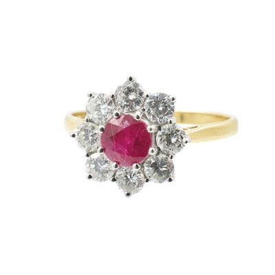 Lot 15 - A 1.30ct synthetic ruby and diamond cluster ring in 18ct gold