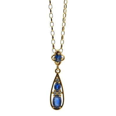 Lot 281 - A synthetic sapphire and diamond drop pendant set in 9ct gold