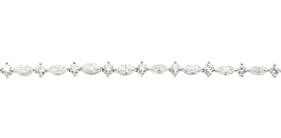 Lot 18 - A 3.50ct marquise and round brilliant cut diamond tennis bracelet, set in 18ct gold