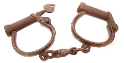 Lot 201 - Pair of WWI British handcuffs, with key,...