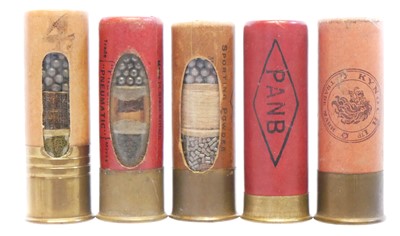 Lot 561 - Three 12 bore Window cartridges and two shop...