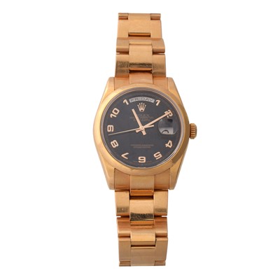 Lot 173 - An 18ct rose gold Rolex Oyster Perpetual Day-Date Chronometer Wristwatch with box and certificates