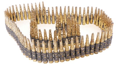 Lot 493 - Belt of fired 7.62mm blank L43A3 ammunition,...