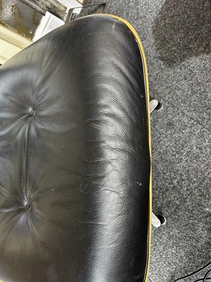 Lot 247 - Lounge Chair and Ottoman