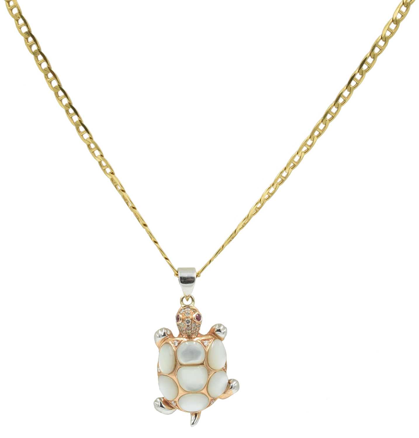 Lot 255 - An 18ct yellow gold and moonstone, diamond and ruby turtle pendant, retailed by Grupa Pagoda