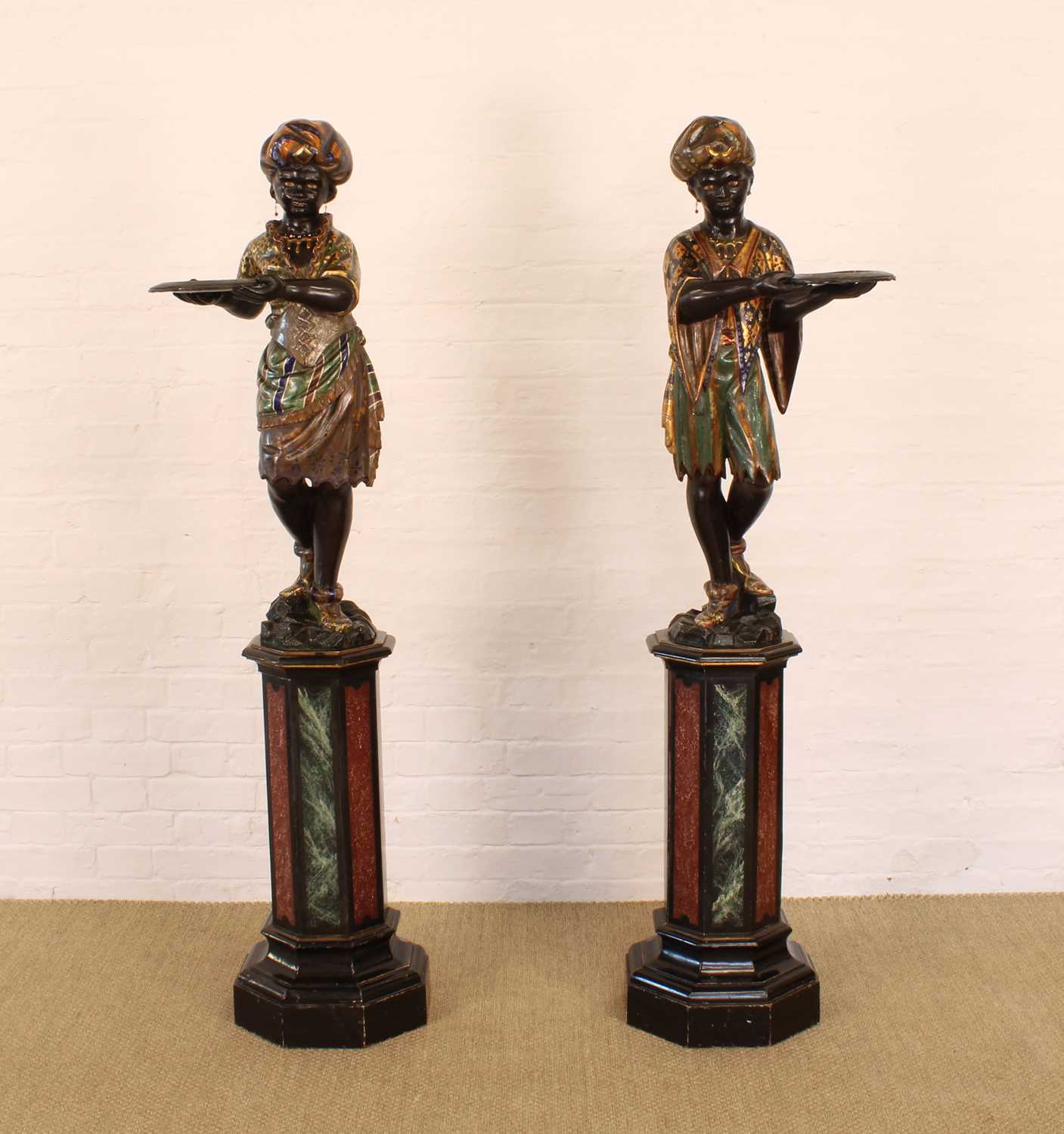 Lot 215 - A Rare Pair of 19th Century Venetian 'Blackamoor' Figures on Integral Stands