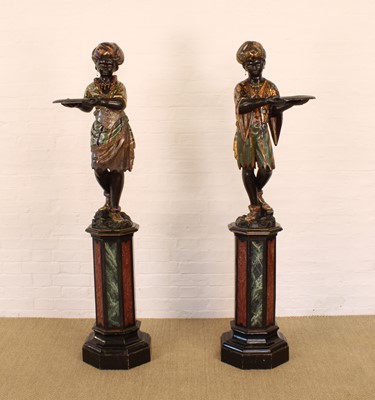Lot 215 - A Rare Pair of 19th Century Venetian 'Blackamoor' Figures on Integral Stands