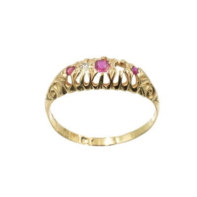 Lot 123 - An 18ct gold, ruby & diamond boat ring