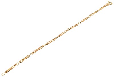 Lot 12 - A 9ct rose gold twisted muff bracelet