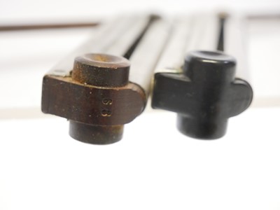 Lot 163 - Two Luger P08 magazines, one with wood base...