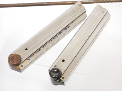 Lot 163 - Two Luger P08 magazines, one with wood base...