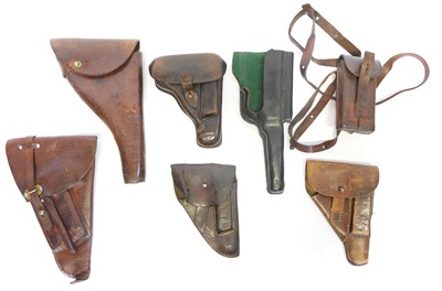 Lot 174 - Six leather pistol holsters, also twin...