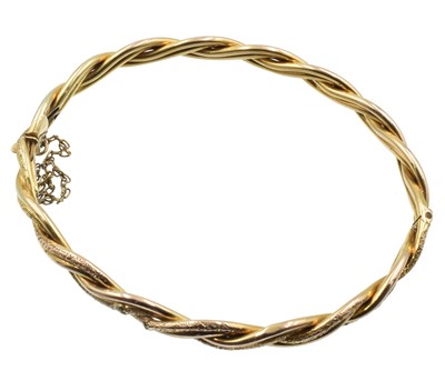 Lot 76 - A 9ct Gold twist bangle