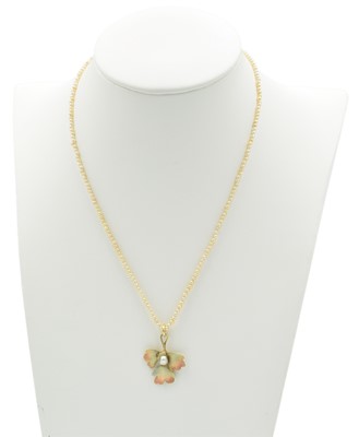 Lot 231 - A seed pearl foliage-style pendant, set in 15ct gold