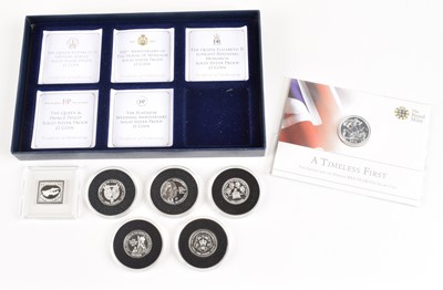 Lot 15 - A good selection of fourteen silver coins and ingots (14)