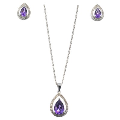 Lot 34 - An amethyst and diamond silver chain set