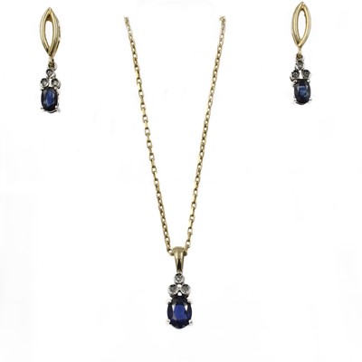 Lot 74 - Synthetic sapphire and diamond 9ct gold pendant set