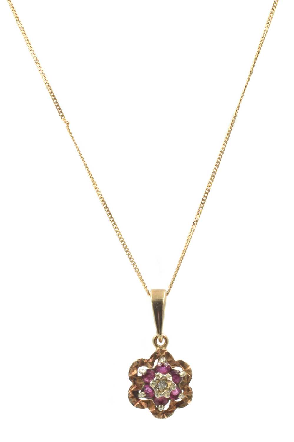 Lot 14 - A 9ct gold, ruby and diamond floral pendant