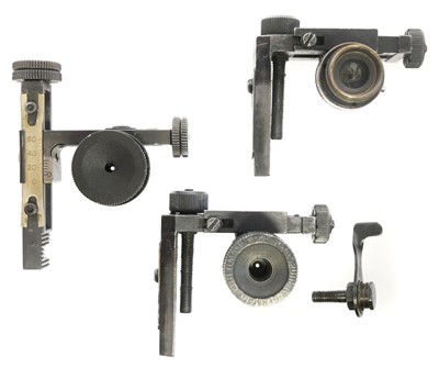 Lot 728 - Three aperture rear sights, two by Brindles,...