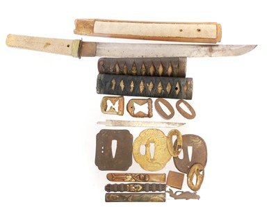 Lot 252 - Collection of Japanese sword parts, to include...