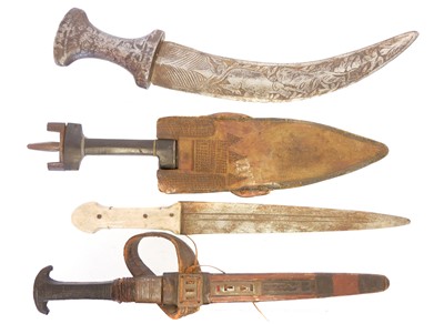 Lot 263 - Four African / Ethnic daggers, two with...