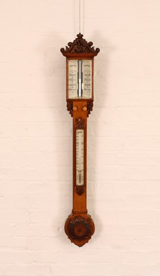 Lot 156 - A Good Victorian Carved Oak Stick Barometer by Dollond of London