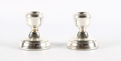 Lot 52 - A Pair of Elizabeth II Silver 'Dwarf' Candlesticks