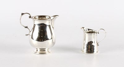 Lot 11 - A George VI Silver Cream Jug and An Edwardian Jug