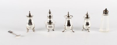 Lot 17 - A Group of Four Silver Pepper Shakers