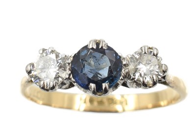 Lot 361 - A sapphire and diamond trilogy ring, set in 18ct gold