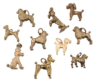 Lot 316 - A selection of ten gold poodle charms