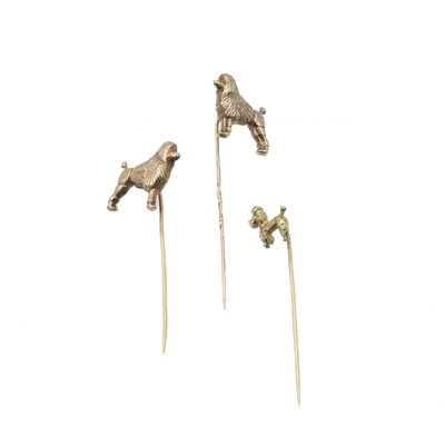 Lot 342 - Three 9ct gold poodle hairpins