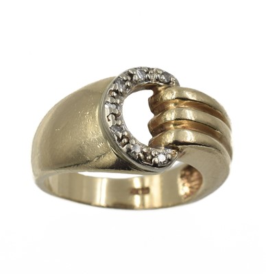Lot 113 - A 14ct gold and diamond horse bit ring