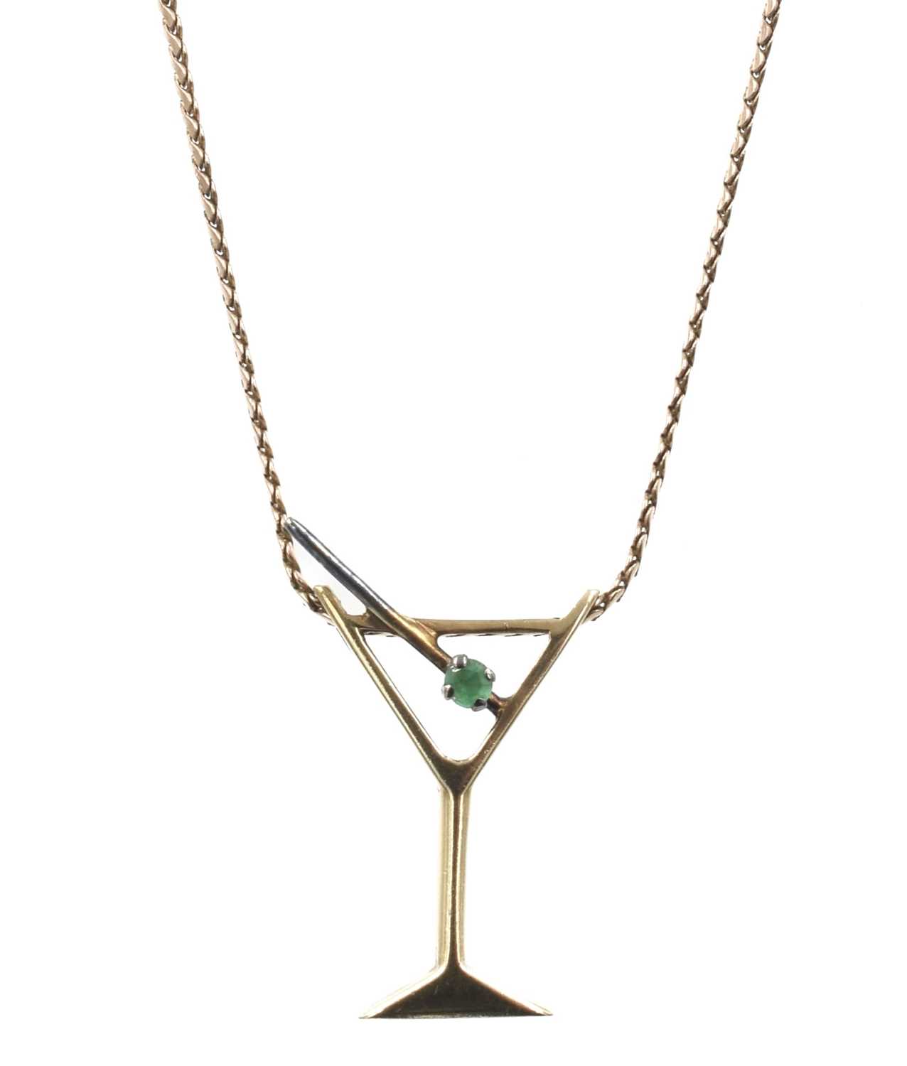 Lot 27 - A 9ct yellow gold cocktail pendant on a curb chain