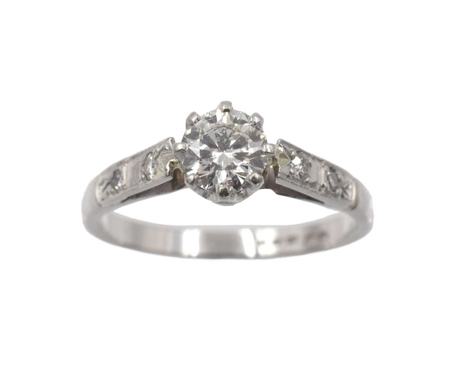 Lot A white metal diamond solitaire ring