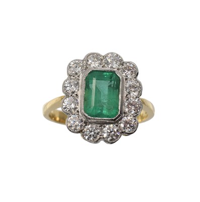 Lot 302 - An emerald and diamond cluster ring, set in 18ct gold