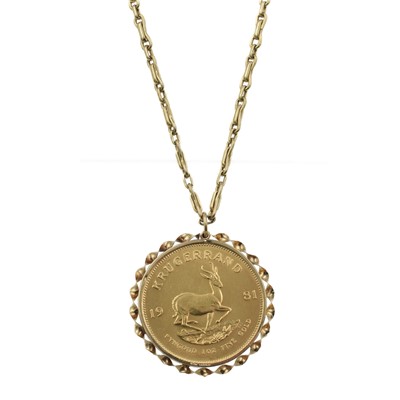Lot 253 - A Krugerrand pendant and chain