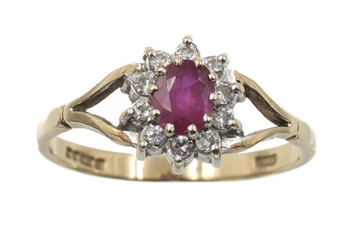 Lot 225 - A ruby and diamond cluster ring, set in 9ct gold