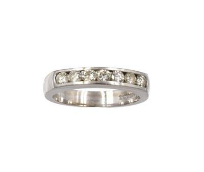 Lot 73 - A diamond half eternity ring, set in 18ct gold