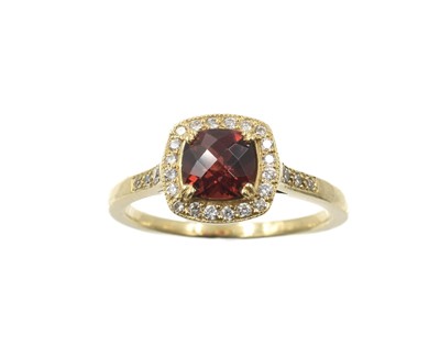 Lot 177 - A garnet and diamond halo ring, set in 18ct gold