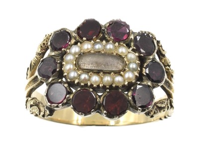 Lot 174 - A Georgian garnet mourning ring, set in 15ct gold
