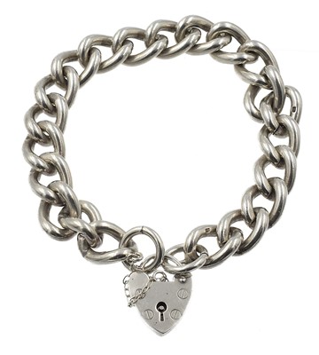 Lot 333 - A silver bracelet with a heart motif