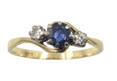 Lot 163 - An 18ct yellow gold sapphire and diamond ring