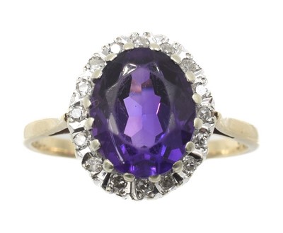 Lot 170 - A 9ct amethyst and diamond cluster ring