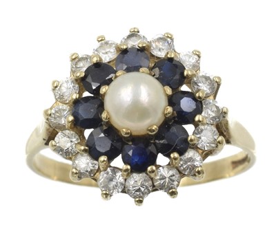 Lot 357 - A pearl and sapphire cluster ring, set in 9ct gold