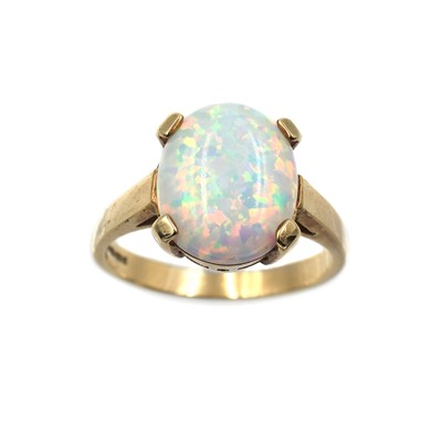 Lot 260 - A 9ct gold and opal solitaire ring