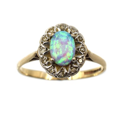 Lot 224 - A 9ct gold, opal and diamond ring