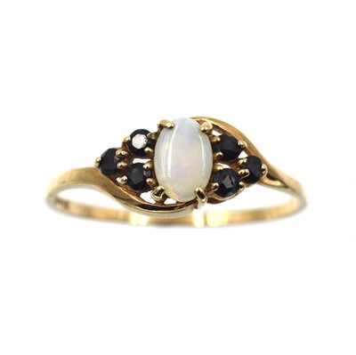 Lot 44 - An opal and sapphire ring, set in 9ct gold