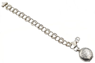 Lot 270 - A Victorian silver sovereign holder with a chain